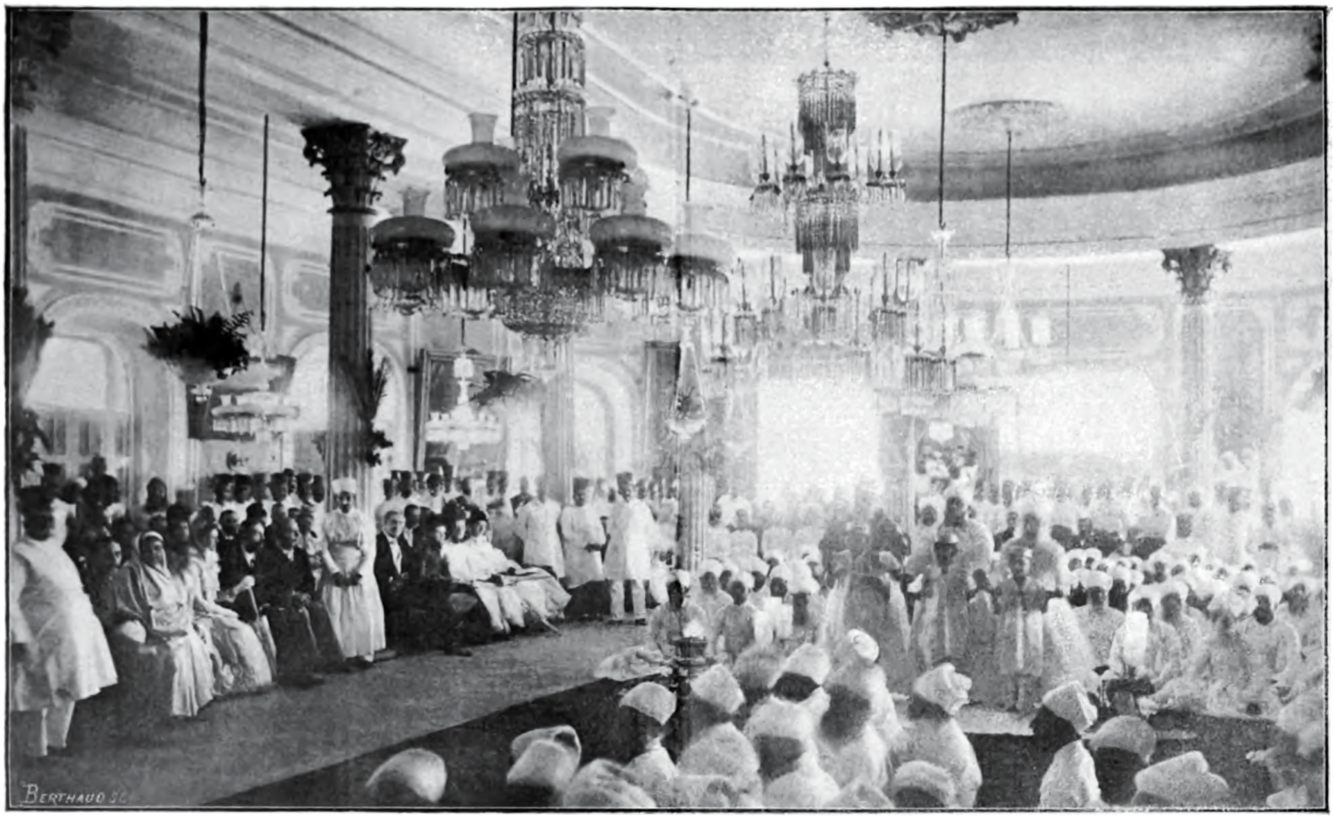 The Navjote — A child receives the sacred shirt and cord and enters the faith — Bombay, a century ago.