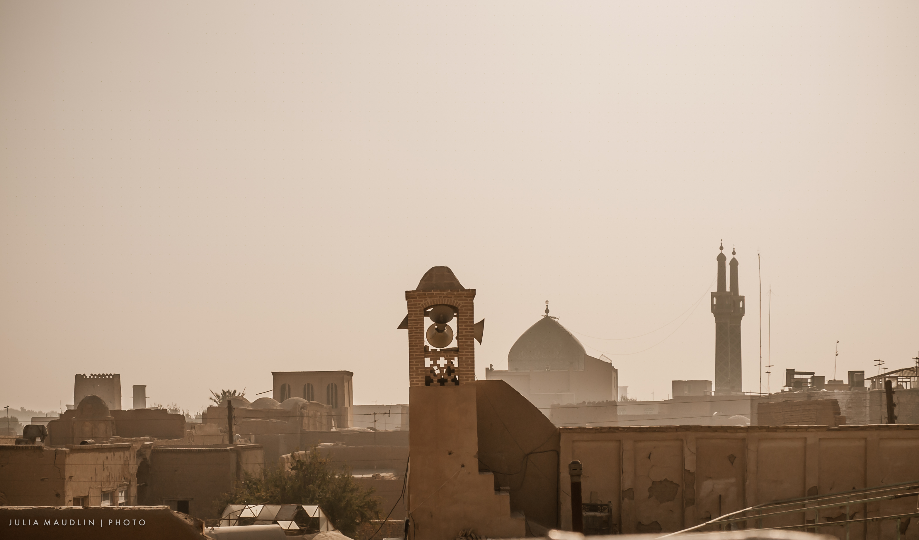 The Rooftops of Yazd — The desert city of wind-towers at dusk — the last great stronghold of the faithful in Iran.